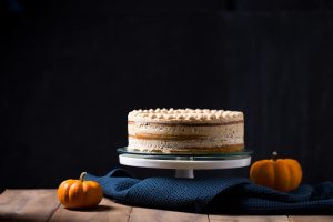 This recipe makes a gorgeous three-layer naked Pumpkin cake frosted with Graham Cracker Cream Cheese Buttercream. It is moist, fluffy and subtle in its sweetness. Excellent for thanksgiving and any fall occasion!